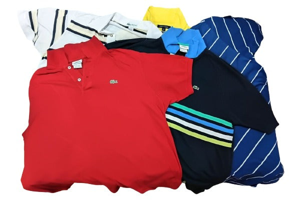 Collection of folded polo shirts in various colors on a white background